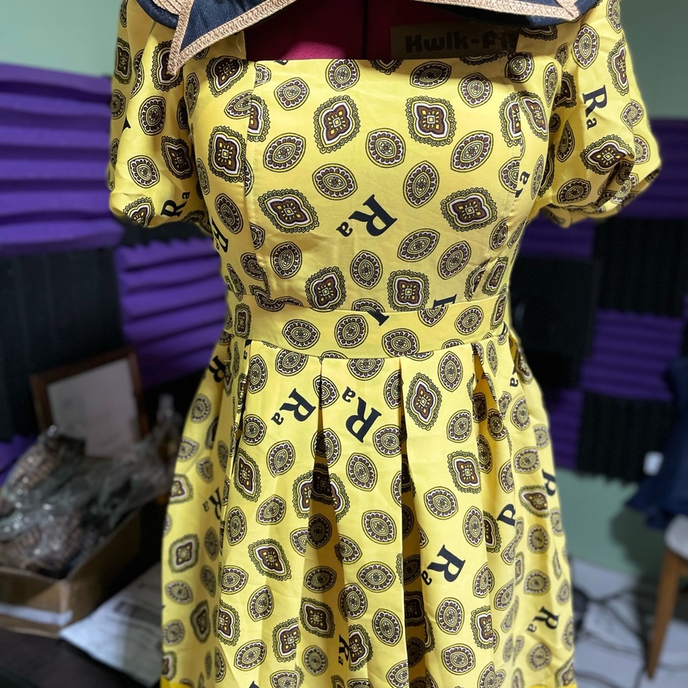 Mini dress, padded and with built in shorts.